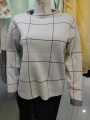White color sweater for females in woolen material by AAIMAs. 