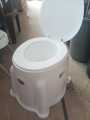 Full Heavy Plastic Commode Chair with Cover. 