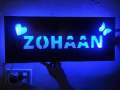 Glowing Name on Wood sheet. 