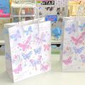 Handle design Butterfly gift bags Elegant Kraft paper material Butterfly print Butterfly treat bags Colorful Bridal goodie bags for Wedding favors Birthday party decorations Baby shower gifts Party. 