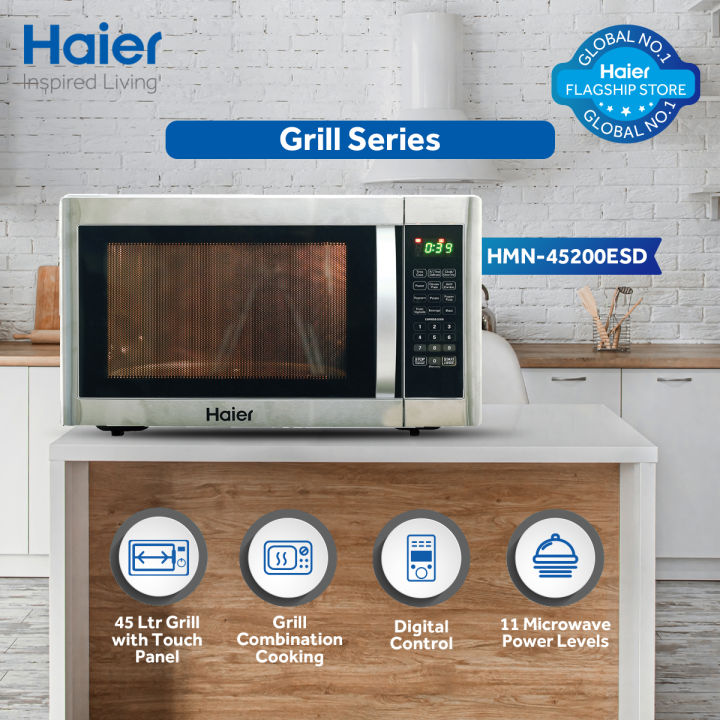Haier 45L / Grill / HMN-45200ESD ( Large Capacity + Touch Press + Internal Light + Pull Handle Door ) / Microwave Oven/ Brand Warranty