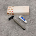 Hotel disposable toiletry set, carton cardboard, card, box, disposable toothbrush, shampoo, toothbrush, comb, hotel supplies. 