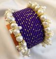 Trendy metal bangles set with pearl bangles golden dotted pearl bangles set bangles for girls in all sizes and colors. 