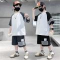 Summer Boys Short sleeved 2023 New Loose Korean Edition Two Piece Set for Big Kids Trendy Children's Wear. 