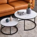 Round Modern Nesting Coffee Table Set of 2, Stacking Living Room Accent Cocktail Tables with an Industrial Wood Finish and Powder Coated Metal Frame, White/Black. 