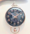 PRETTY GLASS ROUND DESIGN WALL CLOCK WITH ATTRACTIVE HORSE STRUCTURE ON TOP ALONG WITH ROUND PENDULUM IN GOLD TOUCH FANCY AND ATTRACTIVE WALL CLOCK STYLISH DESIGN SMOOTH MACHINE WALL CLOCK HANGING WALL CLOCK HOME DECORATION PERFECT GIFT ITEM. 