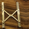 Laptop Stand Creative Folding Storage Bracket 10 Inches. 