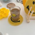 Korean smiley handmade cotton thread woven placemat ins expression insulation pad coaster pot pad cute thick pad. 