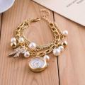 Salenbuy Stylish Golden Pearls Bracelet and Ladies Watch For Girls. 