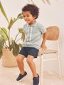 Next UK Textured Knit Button Through Polo Shirt for Baby Boys, Kids. 