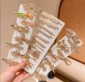 "Dazzling Rhinestone Star Hair Clips: Luxury Diamond Barrettes for Women - Sparkling Jewelry Accessories, Multifunctional Hairpins for Salon, Weddings, and Daily Styling", available in Random design available at your door step in just 399, hurry up. 