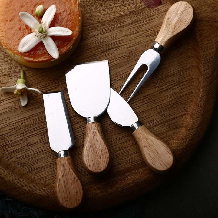 Set Of 4- Cheese Knives with Bamboo Wood Handle- Stainless Steel Cheese Spreader Cutter Knives -  Cheese Slicer and Butter Cutter-  Cheese Knife Set for Cheese serving.