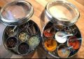Stainless steel spice box in steel with 7 spice containers with see through lid and one spoon. 