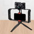 Mt-33 Tripod Vllogging hand handle Kit with adjustable mobile phone holder and stand for flash light, ring light, microphone and camera, DSLR support all smart phones. 