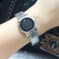 Movado 606505  Stainless Steel Wrist Watch for Girls / Watch For Women. 