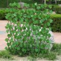 Retractable Wooden Fence with Green Leaf-Artificial Wooden Green Leaf Fence 2 feet (24 inches)-Small Retractable Money Plant Leaves Fence- Bail of leaves - Wood Vines Climbing Frame Gardening Plant Home Decoration Size 2 feet. 