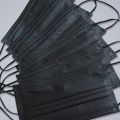 50-Pack Black Disposable Fashion Face Masks – 3-Layer, 70 GSM Protection. 