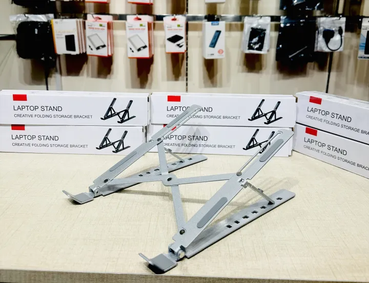 Portable%20Aluminum%20Foldable%20Laptop%20Metal%20Stand%20Adjustable%20Height%20Folding%20Laptop%20Holder%20Solid%20Stand%20With%20Anti%20Slip%20Rubber%20Grips%20-%20Silver%20-%20Image%206