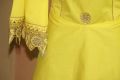 Yellow Stylish mini embroidered frock. 