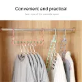 Multiple Clothes Hanger Space Saving Wardrobe Organizer with 9 Holes for Shirts and Pants. 