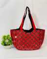 Aare And Mirror Work Embroidered Hand Bag. 
