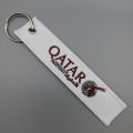 1 PC QATAR AIRWAYS Keychain White Double Sided Embroidered Keychain Fashion Gifts Pilot Trinkets. 