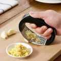 Manual Garlic Press Rocker with Handle Stainless Steel Garlic Crusher Squeezer Slicer Gadgets Tool For Garlic Paste. 