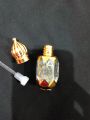 5 pcs 6ml Tomb Empty Fancy bottle with stick for Attar use all fragrance 6ml attar bottle travel size golden printed. 