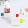 Pack of 4 Plastic Rotary Toothpaste Squeezer Device - Durable Rolling Tube Paste Squeezer & Dispenser - Manual Rotary Paste Holder. 