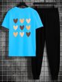 Hearts Printed Sport Set Summer 2-Piece Outfit Short Sleeve T Shirts and Pants Stylish Casual Tracksuit For Women. 