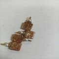 Golden colour square shape glitter stone size is 14/14 for sale in very reasonable price.. 