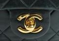 Chanel Black Quilted Lambskin Mini bag. 