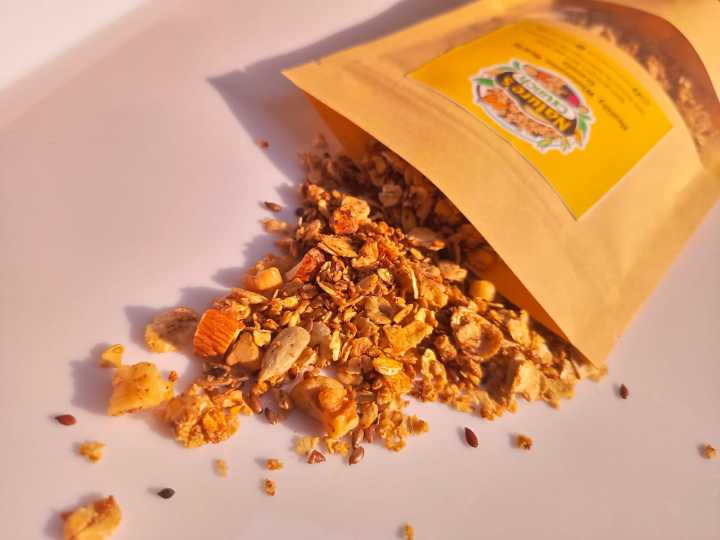 Nature's%20Crunch%20Granola%20100GMS%20VANILLA%20Almonds,,%20Rolled%20Oats,%20Sunflower%20seeds,%20Flaxseeds,Perfect%20for%20quick%20energy%20boost%20100%25%20Organic%20-%20Image%204