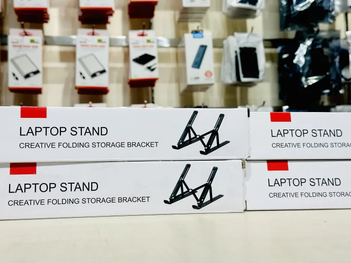 Portable%20Aluminum%20Foldable%20Laptop%20Metal%20Stand%20Adjustable%20Height%20Folding%20Laptop%20Holder%20Solid%20Stand%20With%20Anti%20Slip%20Rubber%20Grips%20-%20Silver%20-%20Image%204