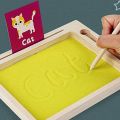 Kids Wooden Sand Tray with Wood Pen – Montessori Sensory Writing Practice Board for Early Learning & Tracing (2025-27). 