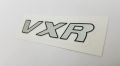 Product details of VXR Monogram Badge - Sticker - Suzuki Alto Car - Chrome Silver Premium Quality Durable Easy to Install Gives Your Car a Genuine Look Made with the Finest Quality Material Only for Suzuki. 