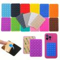 “Silicone Suction Pad Mobile Phone Holder – Self Adhesive Anti-Slip Dashboard & Desk Mount Mat (8x55cm)”. 