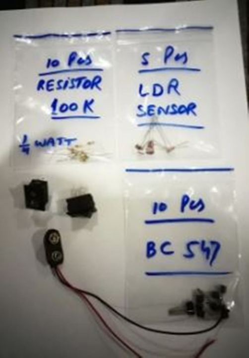 Electronic%20Parts%20Kit#7%20(Kit%20Number%207%20with%205%20Parts)%20-%20Resistor%20100K%201/4W%2010Pcs%20-%20Transistor%20BC547%2010Pcs%20-%20LDR%20Sensor%205Pcs%20-%20On/Off%20Switch%202Pcs%20-%209V%20Battery%20Clip%201Pcs%20-%20Image%203