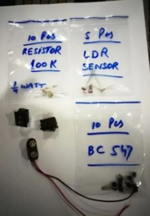 Electronic%20Parts%20Kit#7%20(Kit%20Number%207%20with%205%20Parts)%20-%20Resistor%20100K%201/4W%2010Pcs%20-%20Transistor%20BC547%2010Pcs%20-%20LDR%20Sensor%205Pcs%20-%20On/Off%20Switch%202Pcs%20-%209V%20Battery%20Clip%201Pcs%20-%20Image%203