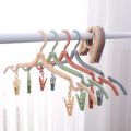 Travel Portable Creative Plastic Hanger Multifunctional Simple Folding Non-slip Clothes Rack with Clips Household Space Saving Storage Tools. 