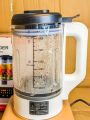 Heating Blender,  High-performance 100% high-speed pure moto, Unbreakable 1800ML container, Crushes ice with ease,  Six tough stainless steel cutting blades, Heat Power: 600W, Stir Power: 400W. 