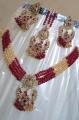 Red and copper bridal jewellery set. 