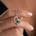 Eternal Affection Stainless Steel Heart Pendant Necklace with 100 Languages I Love You Display. 