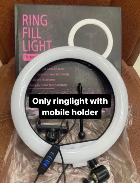 26cm%20Ring%20Light%20With%20Mobile%20Holder%20in%20Three%20Different%20Mode%20Light%20With%20And%20Without%207Feet%20Tripod%20Stand%20(Kidnly%20Select%20Your%20Variation)%20-%20Image%202