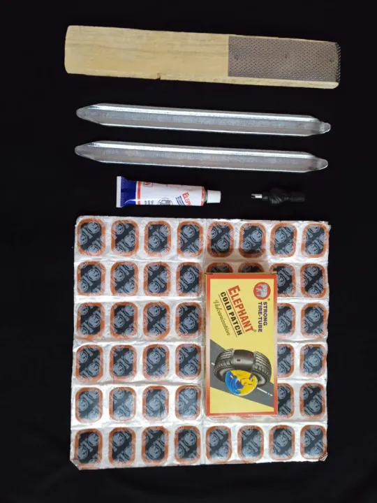 Puncture%20Repair%20Kit:%20%20foot%20Air%20Pump%2048%20Cold%20%20puncture%20patch%20,%20Film,%20Glue,%20File%20&%202%20tyre%20Levers%20%20Set%20-%20For%20Bikes,%20Motorcycles%20&%20More%2048%20Cold%20Repair%20Rubber%20Tire%20travel%20%20puncture%20kit%20-%20Image%207