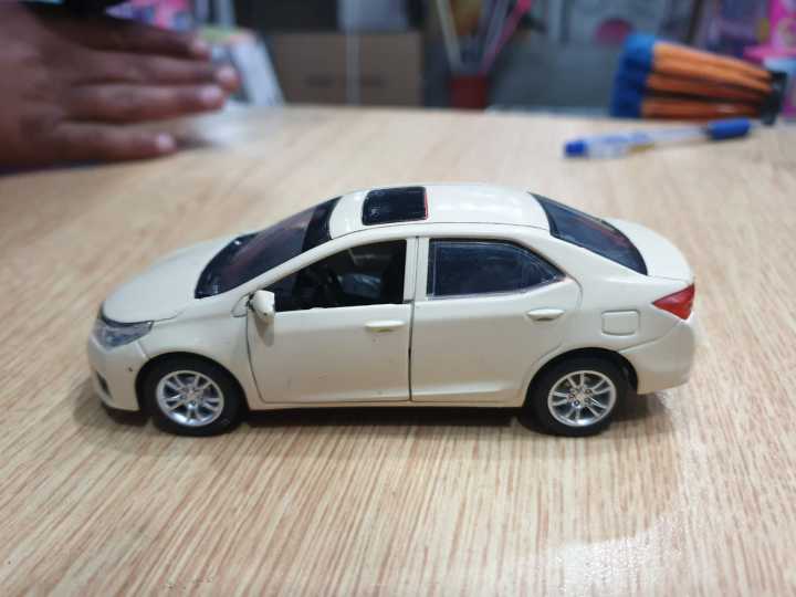 Toyota%20Corolla%20Grande%201:36%20scale%20diecast%20model%20toy%20car%20collection%20Random%20Color%20pull%20back%20action%20-%20Image%203