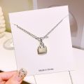 Fashion Hypoallergenic Jewelry Zircon Bag Pendant Necklace Minimalist Tarnish Free Stainless Steel Choker Necklace For Women. 