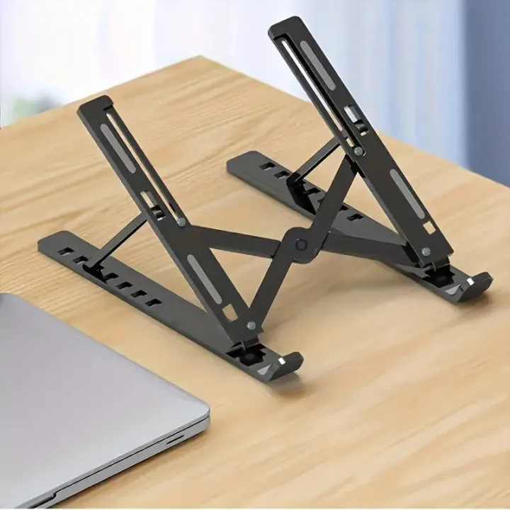 Metal%20Laptop%20Stand%20Portable%20Laptop%20Stand%207%20Gear%20Slot%20Anti%20Slip%20Silicone%20Foldable%20Adjustable%20Laptop%20Stand%20Compatible%20with%20all%20sizes%20of%20Laptop%20Easy%20to%20Carry%20Smart%20Stand%20Strong%20Material%20High%20Quality%20Stand%20Silver%20Color%20-%20Image%203