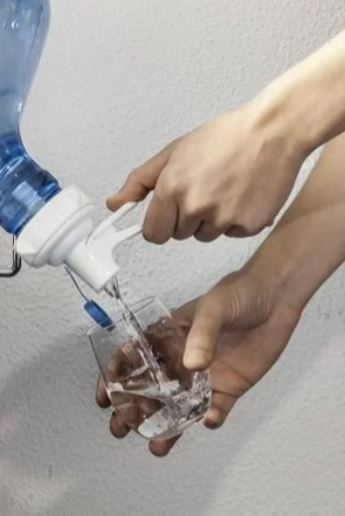 High%20Quality%20Water%20Bottled%20Tap%20Dispenser%20%E2%80%93%20Eco-friendly%20Refillable%20Bottle%20Cap%20-%20Image%203