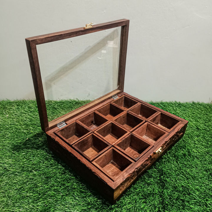 Spice%20Container%20(%20Masala%20Box%20)%20Made%20of%20Pure%20Rose%20Wood%20with%20Hand%20Carving%20Having%2012%20removable%20boxes%20with%20capacity%20of%20over%20100%20Gram%20(Powder%20Spices)%C2%A0with%C2%A0Glass%C2%A0Lid%20and%20one%20Spoon%20-%20Image%202